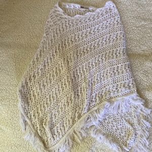 White knitted poncho